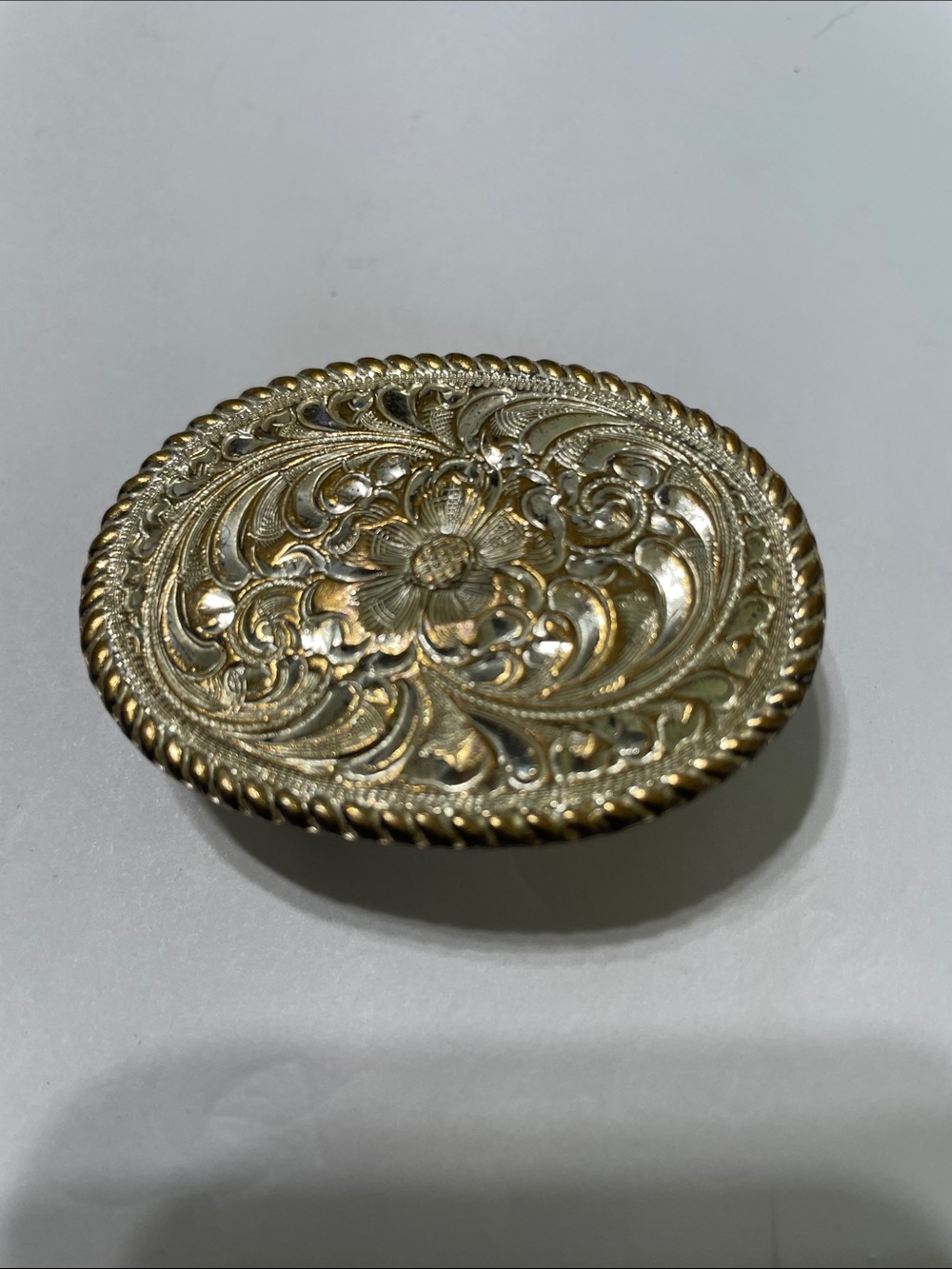 Crumrine Ornate Floral Gold-Tone Belt Buckle. eBay - $18.  7/2/6